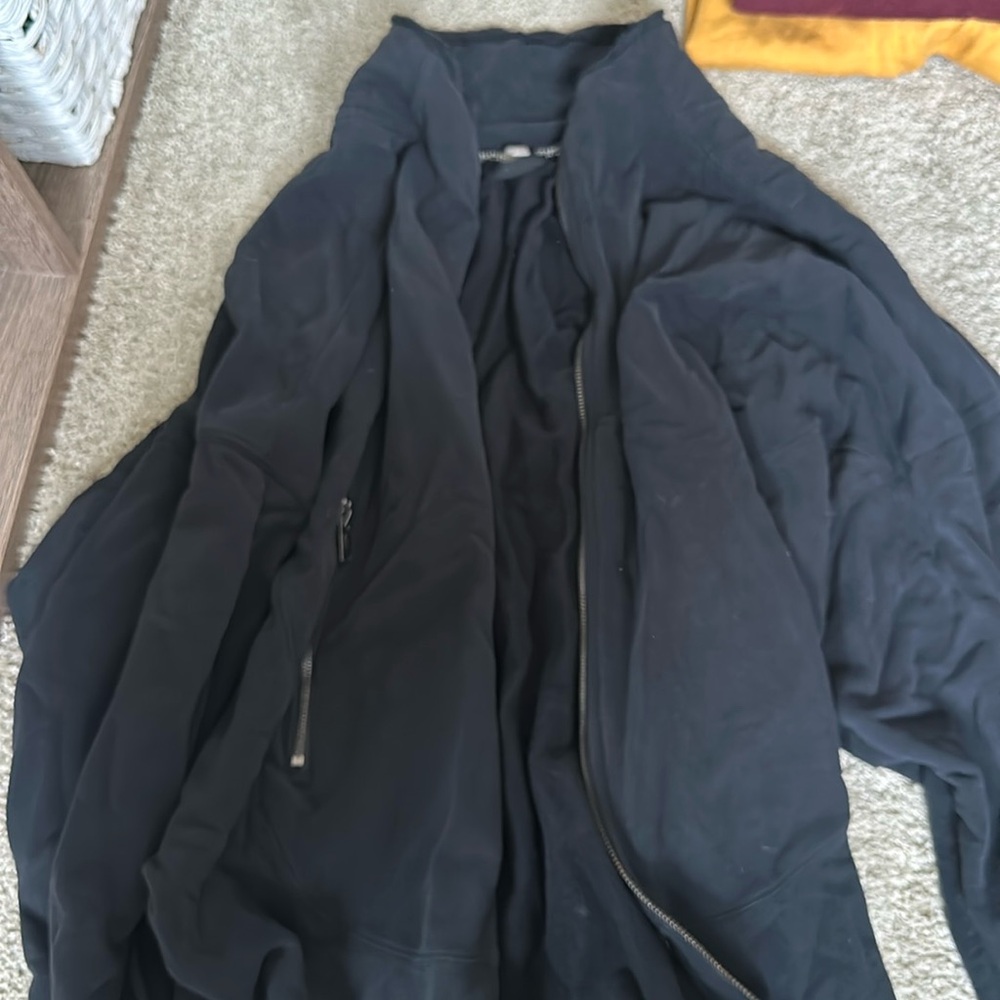 Free people movement zip up, size large.